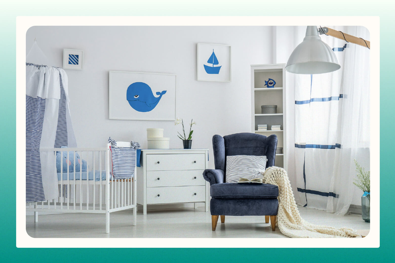 Mostly white baby nursery with accents of blue and an ocean theme