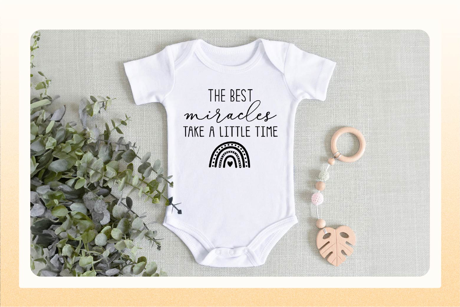 White onesie that says "The best miracles take a little time"