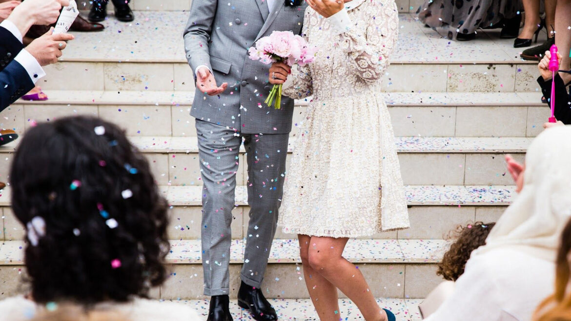 newlywed couple exiting wedding ceremony