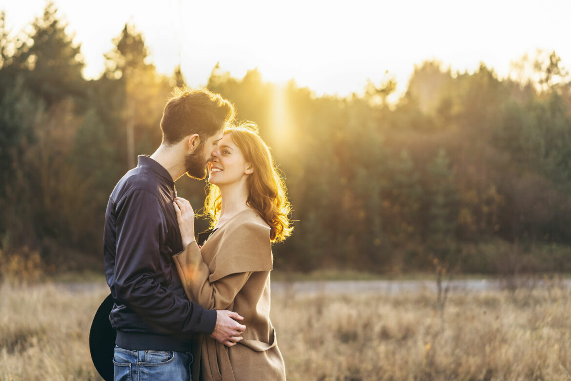 Fall Proposal Ideas - man and woman embracing in a field