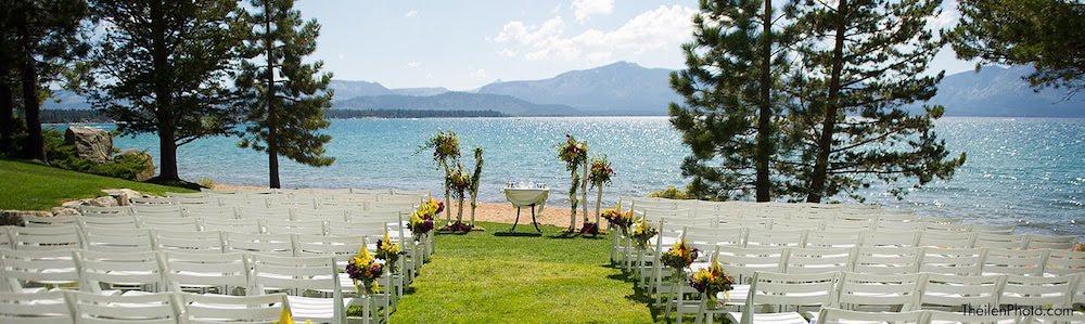 white chairs and floral displays set for a wedding reception on the shore of lake tahoe at the edgewood tahoe