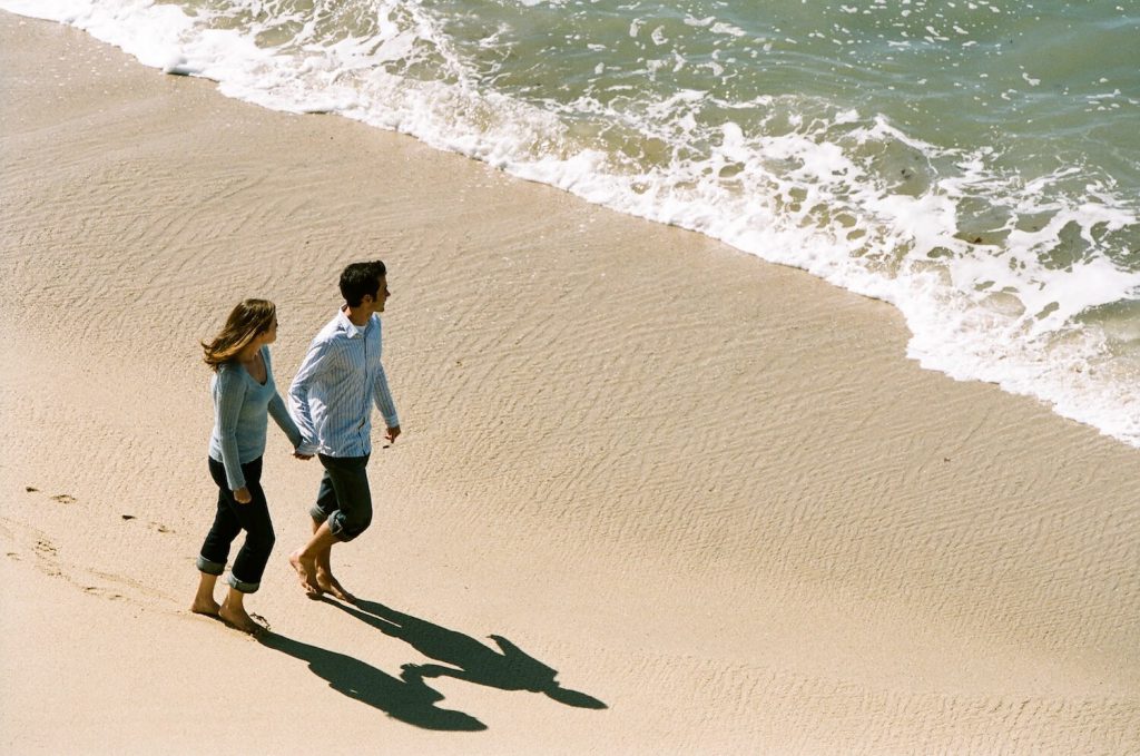 head to the beach summer engagement photo idea