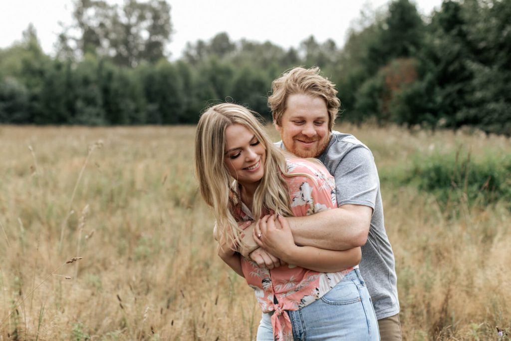 embrace movement summer engagement photo idea