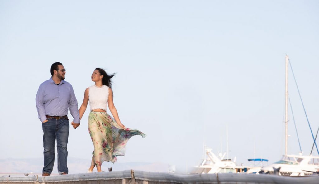 utilize a boat dock or marina summer engagement photo idea