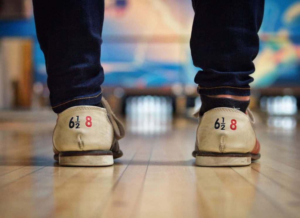 bowling alley showdown rehearsal dinner idea