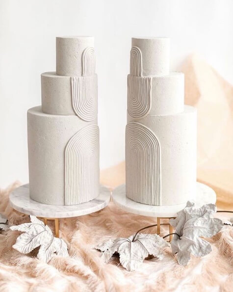 creatively designed white wedding cake unique wedding cake idea
