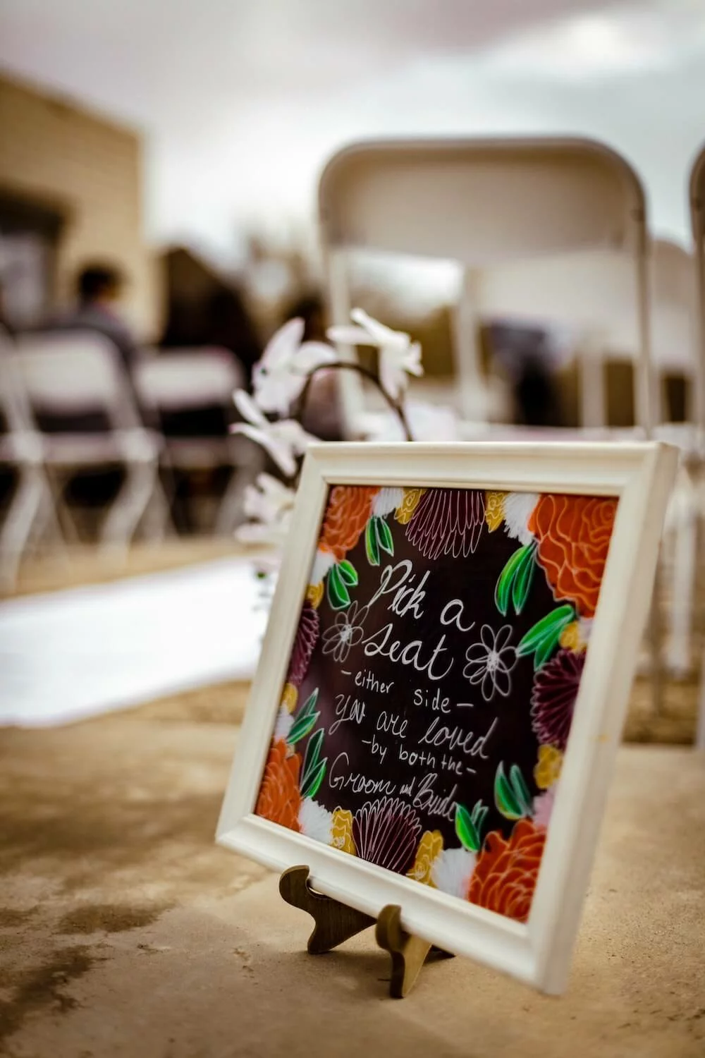 Find your seat wedding reception eucalyptus sign