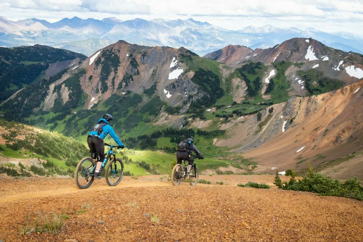Two people mountain biking on their honeymoon
