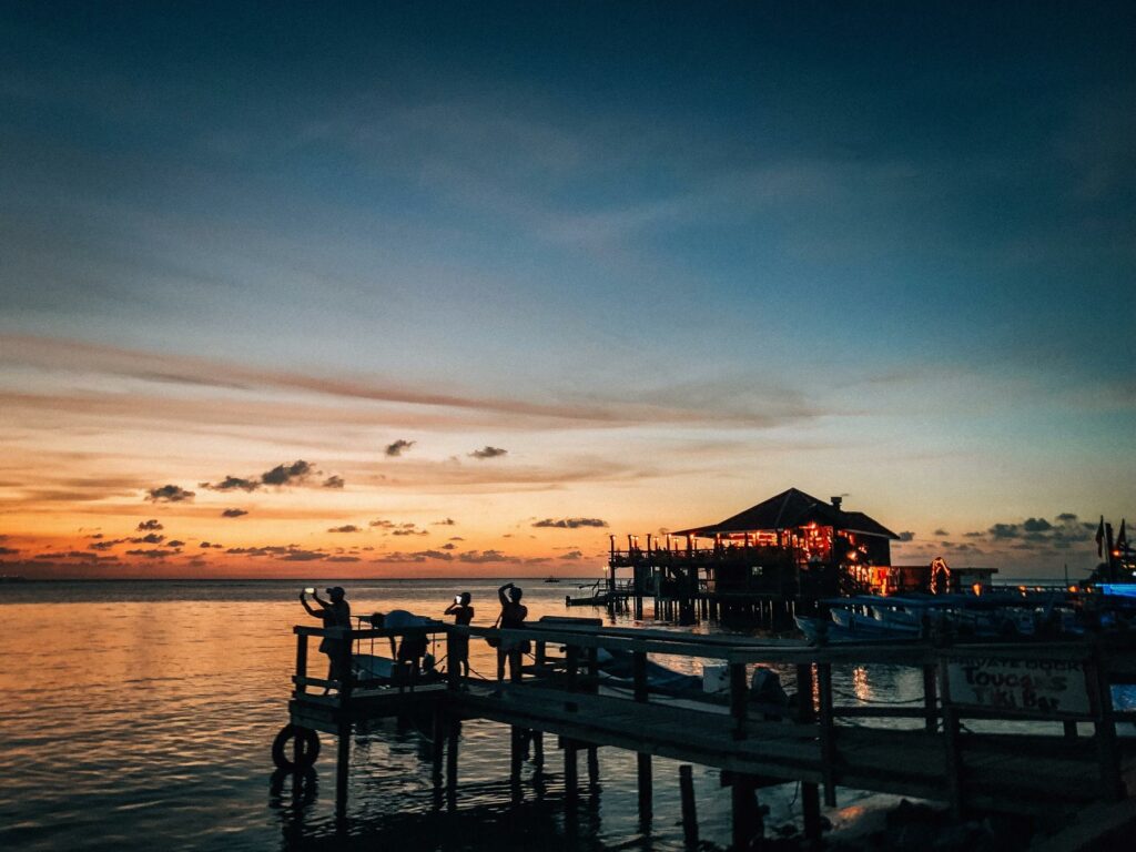 People viewing the sunset in Roatan