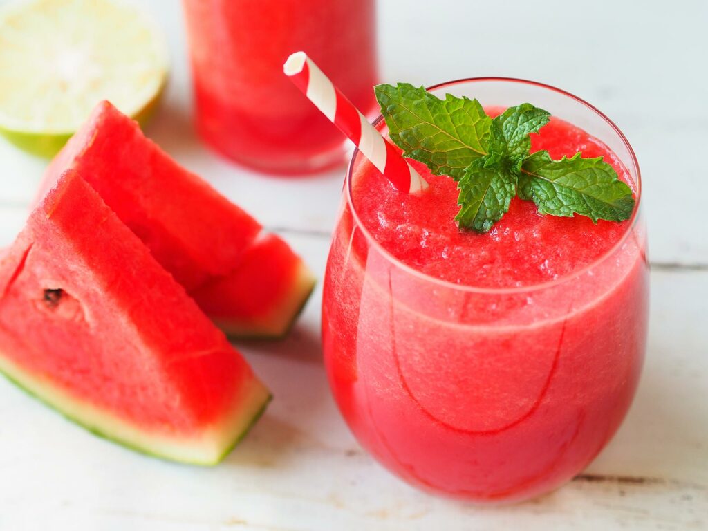 Watermelon wine slushie with a mint garnish