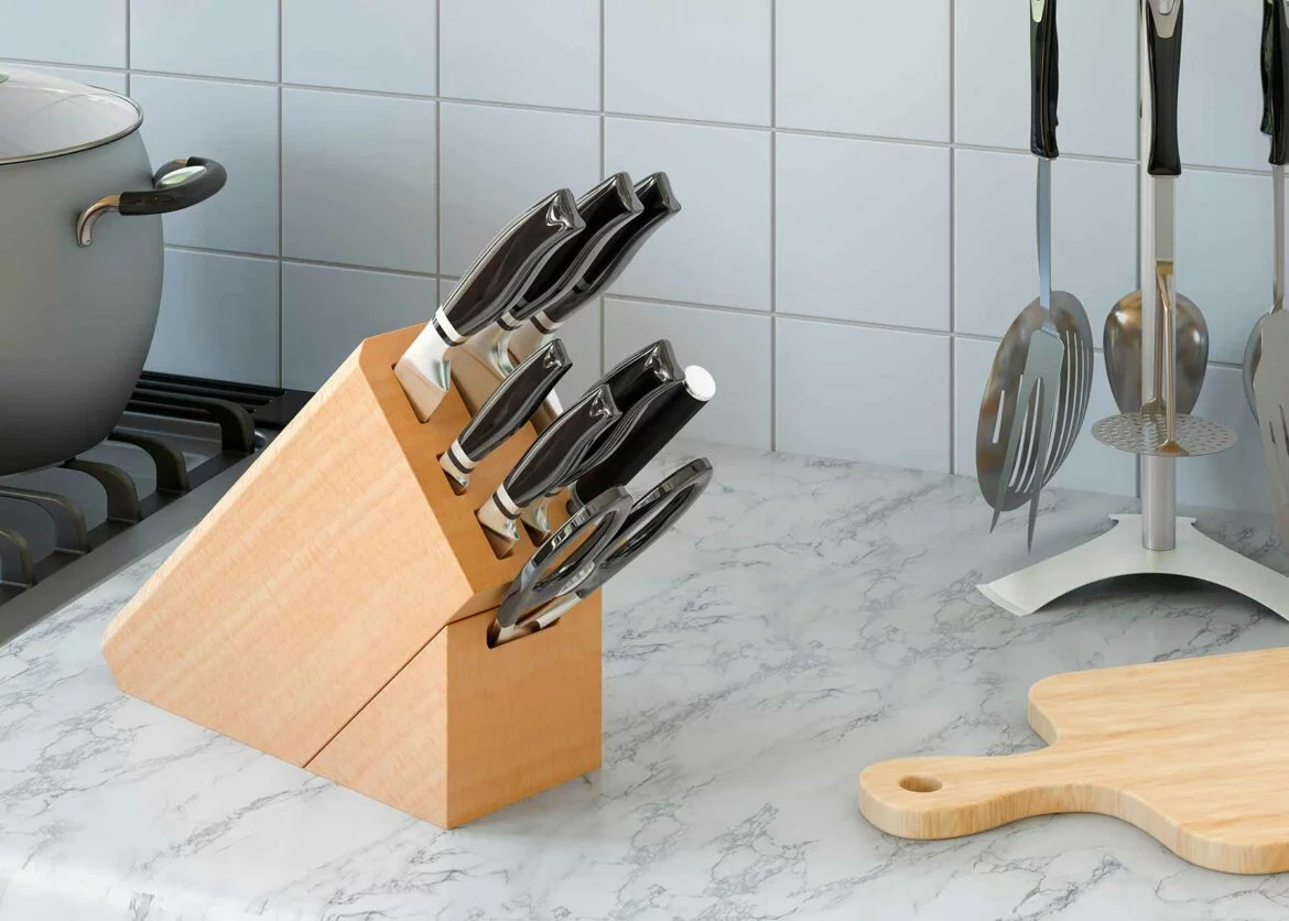 A wooden knife block set on a kitchen countertop