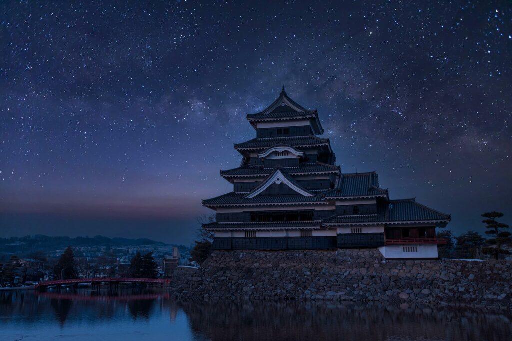 A frozen lake in front of Matsumoto Castle in Nagano, Japan