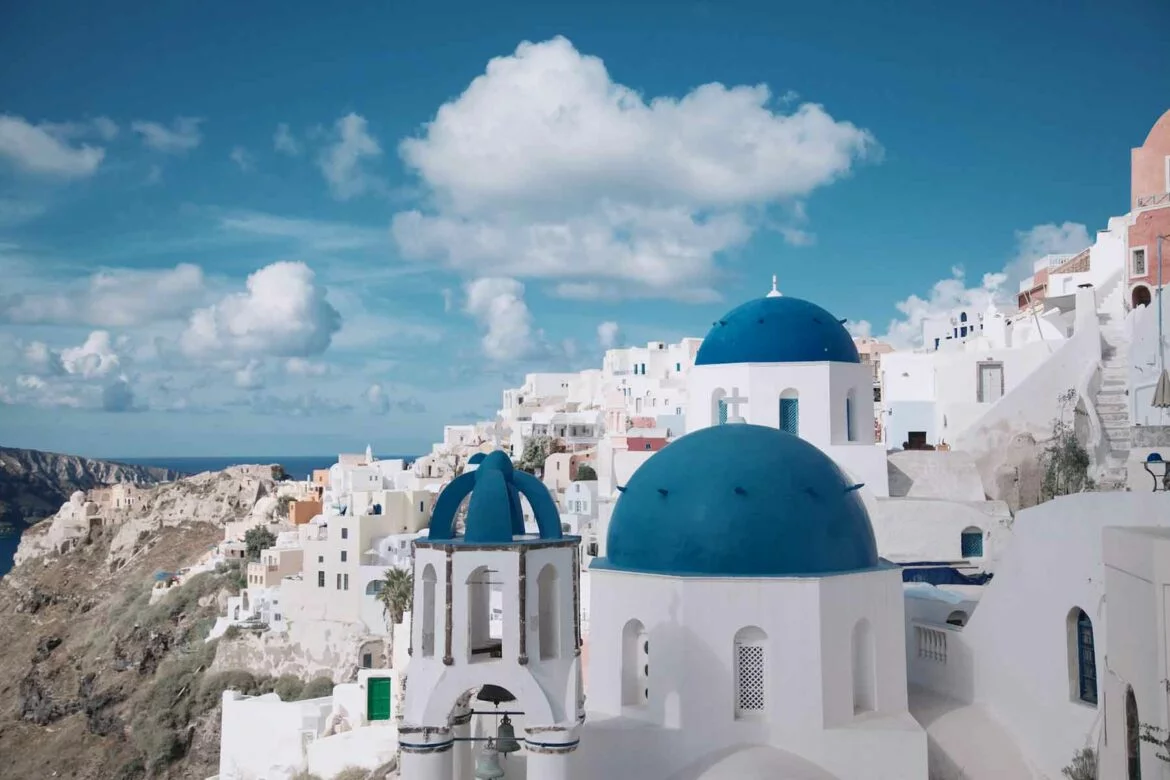 White buildings with blue roofs in Santorini, Greece