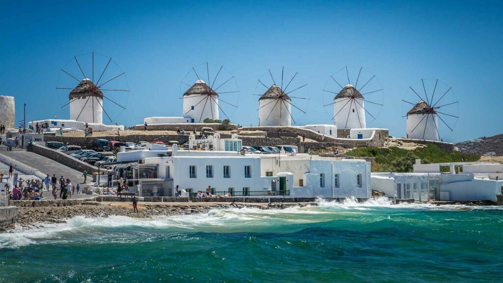 Famous windmills during a clear and bright summer day in Mykonos, Cyclades Islands, Greece. 