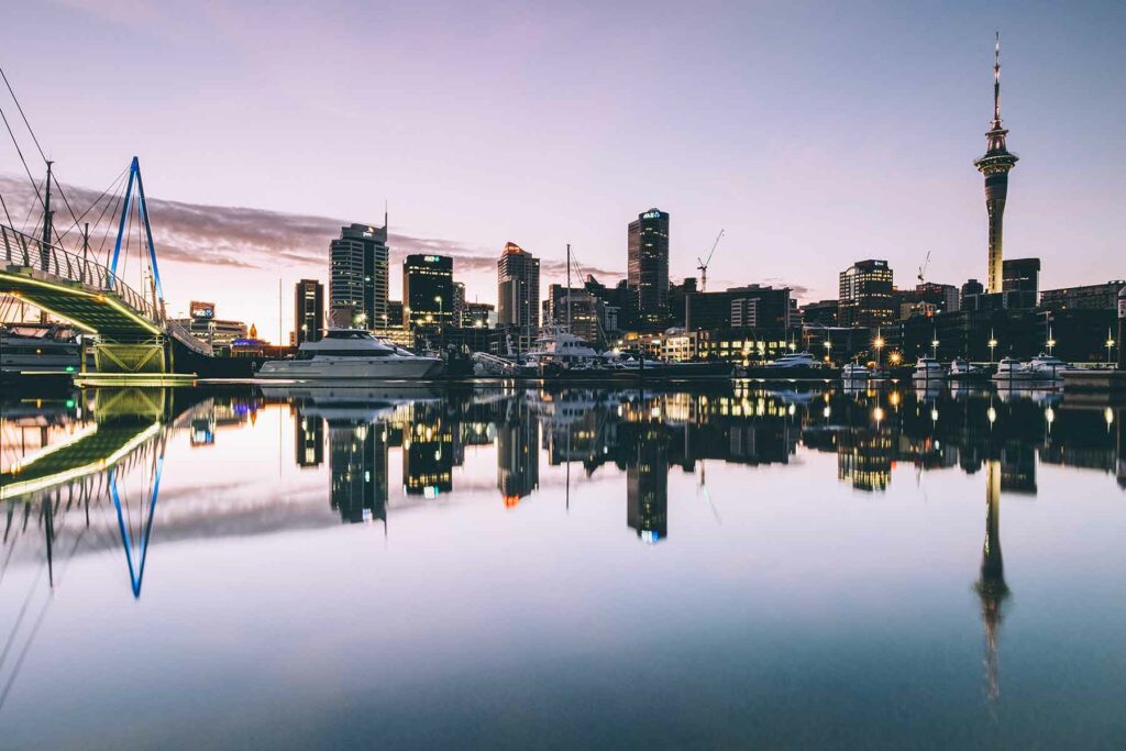 A cityscape of the skyline and water in Auckland, New Zealand