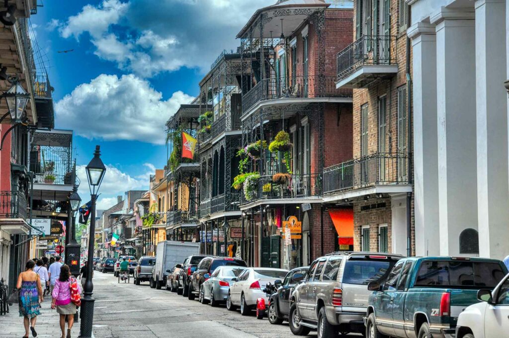 A busy street with colorful buildings in New Orleans, Louisiana