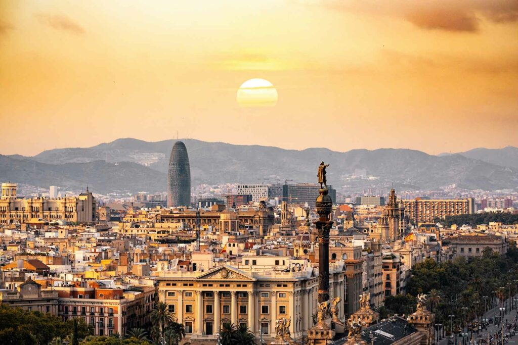 An aerial view of Barcelona, Spain at sunset