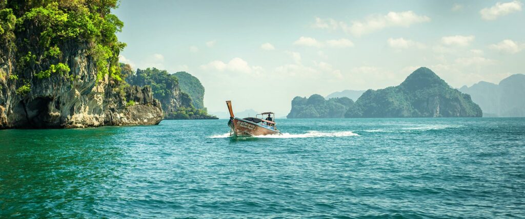 A boat in the waters of Thailand off Koh Hong Island