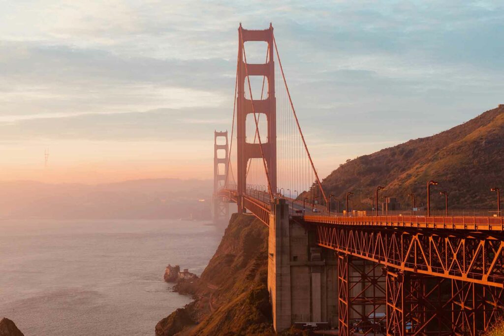 A view of the Golden Gate Bridge at sunset during a honeymoon in California