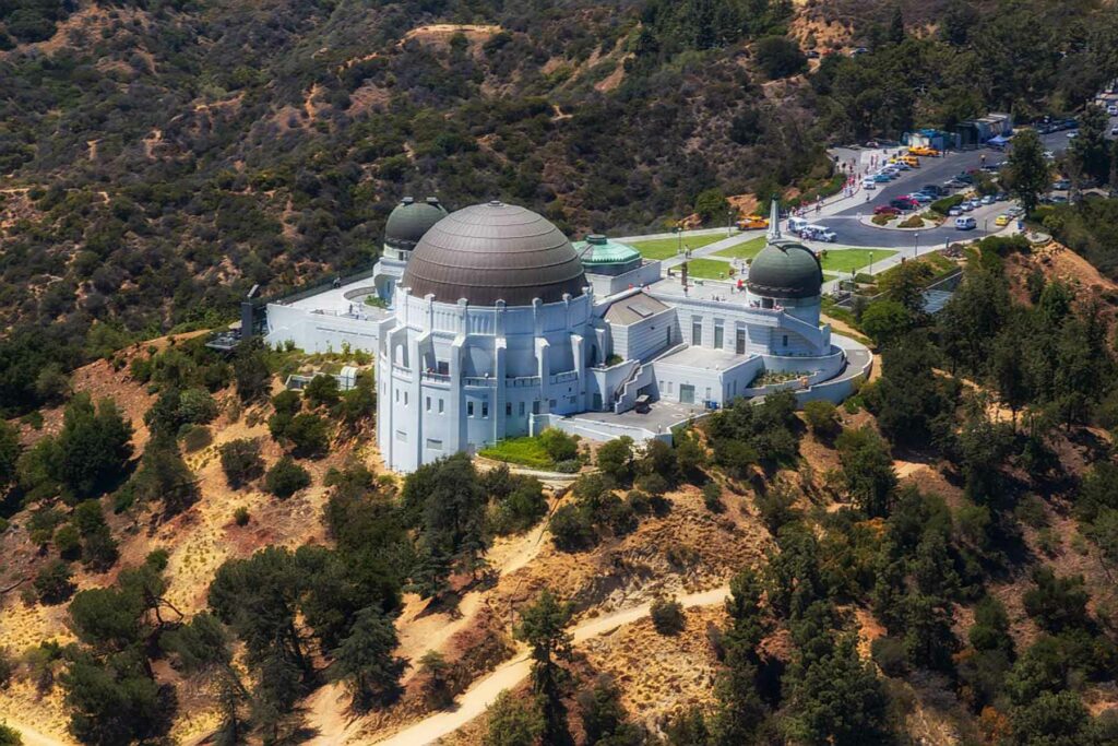 An aerial view of Griffith Observatory nestled in the hills