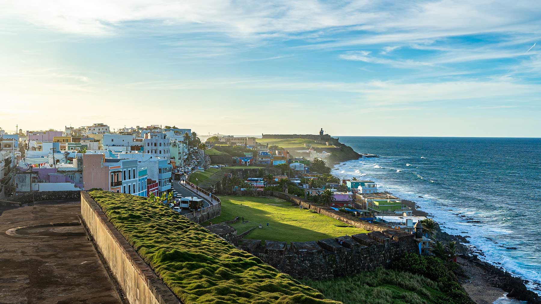 A view of Old San Juan in Puerto Rico with colorful buildings overlooking the water