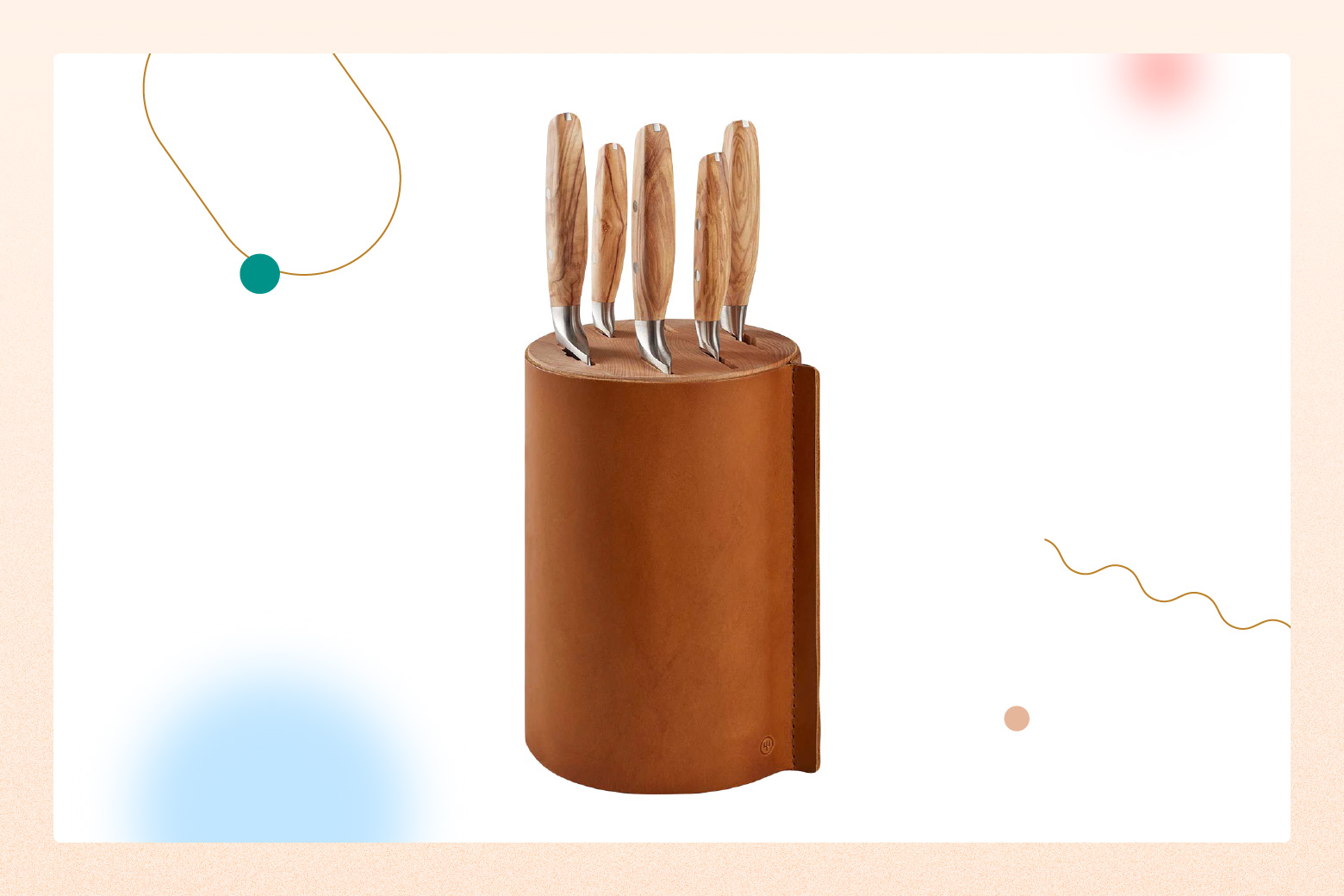 product photo of wooden-handled knives in leather-bound circular knife block