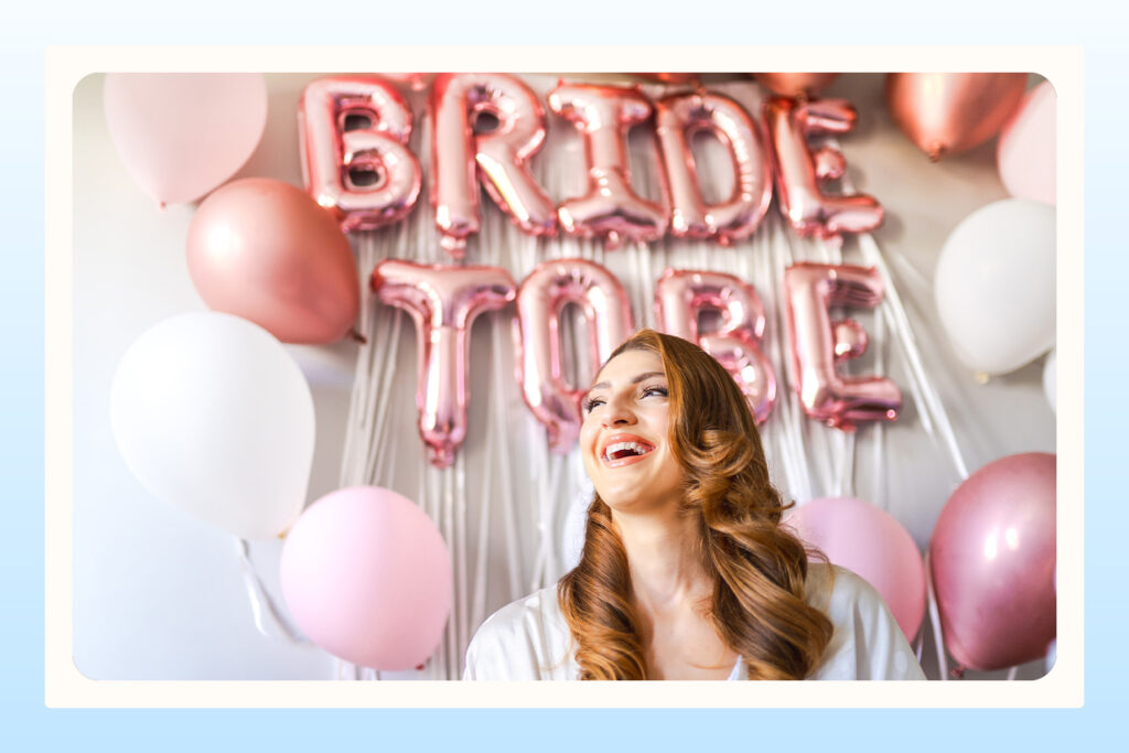 bride to be with balloons enjoying bridal shower surprise