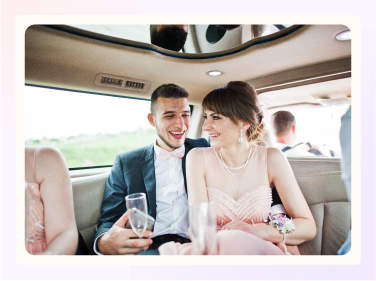 A stretch limo brings the wedding party to the reception