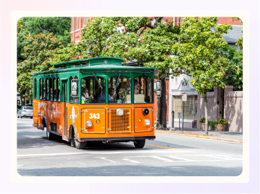 A trolley bus brings guests to the wedding venue