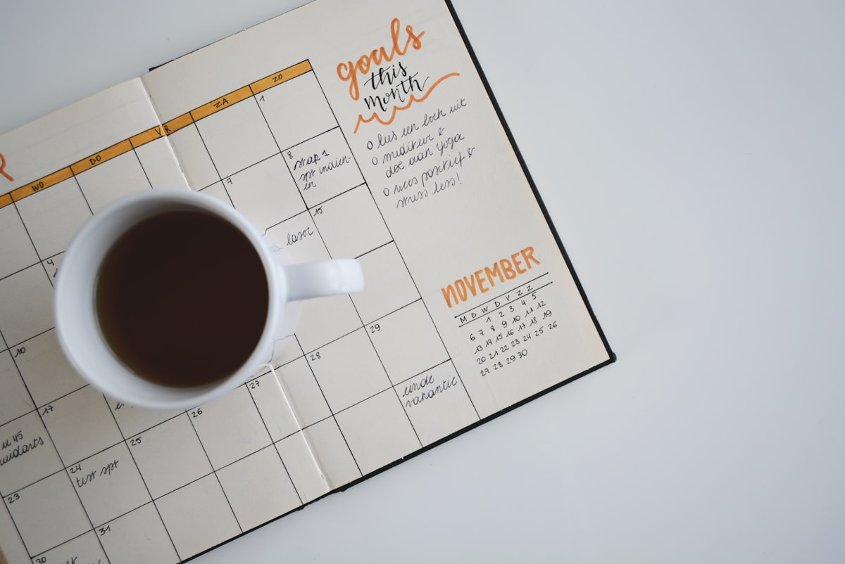 Weekend itinerary planned out on a calendar and notebook