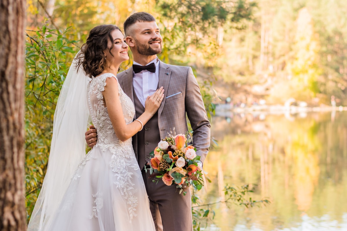 Couple celebrating vow renewal with champagne
