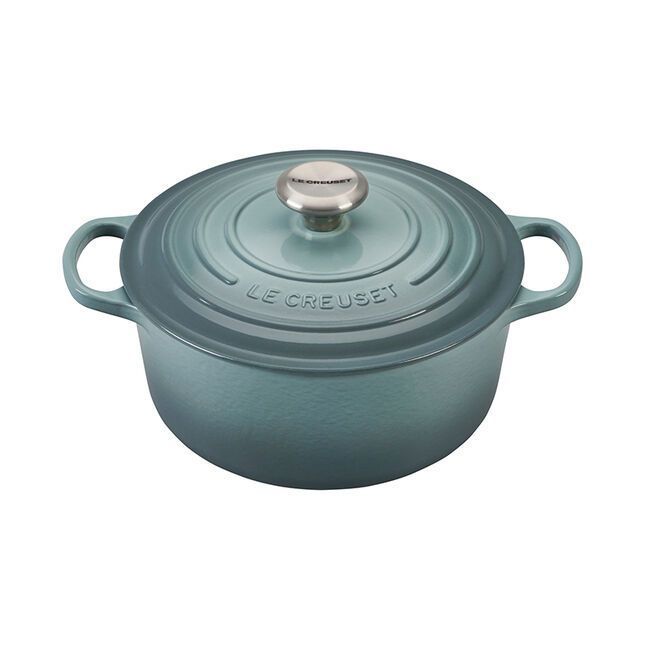 Le Creuset Signature 5.5-Quart Round Dutch Oven in the blue-green sea salt color with metal knob