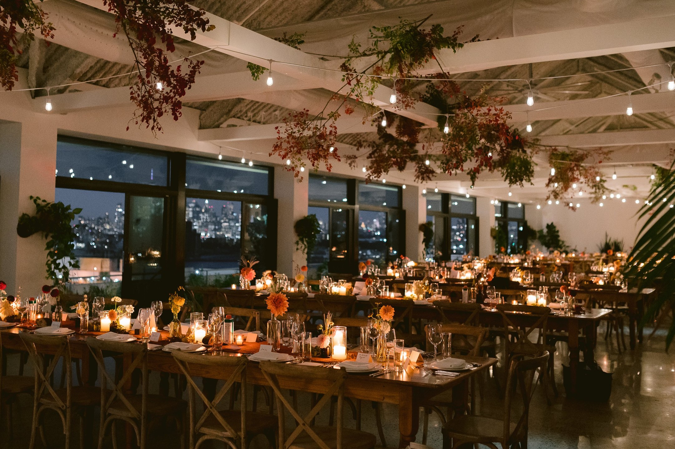 candlelit dinner reception with city views